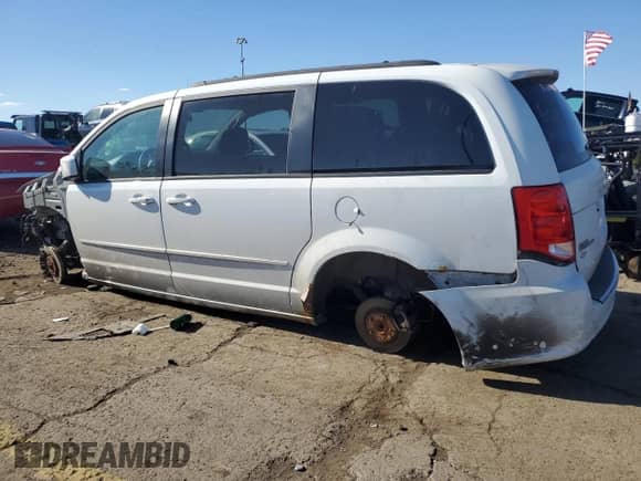 2014 Dodge Grand Caravan SXT with VIN 2C4RDGCG2ER206091, listed as a Copart auction lot 86155385 with Not provided miles and Clean title. Bid and sale history available at DreamBid. Image 2.