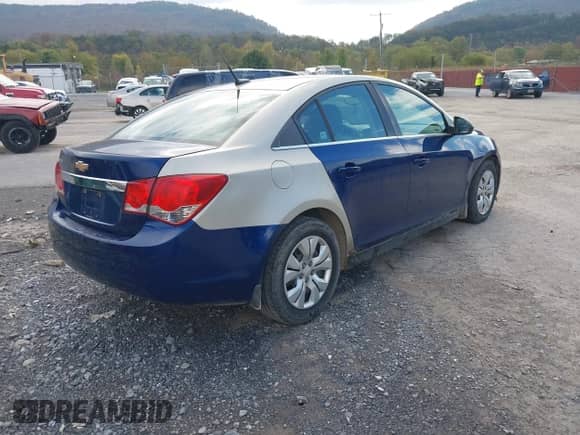 2014 Chevrolet Cruze LS with VIN 1G1PA5SG0E7190408, listed as a IAAI auction lot 43389511 with 158,021 mi miles and . Bid and sale history available at DreamBid. Image 4.