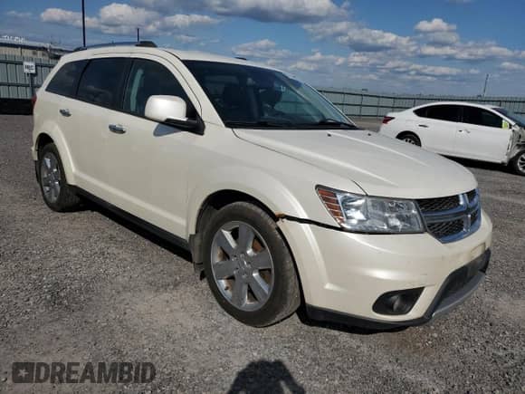 2013 Dodge Journey R/T with VIN 3C4PDDFG8DT615337, listed as a Copart auction lot 71976855 with 211,359 mi miles and Clean title. Bid and sale history available at DreamBid. Image 4.