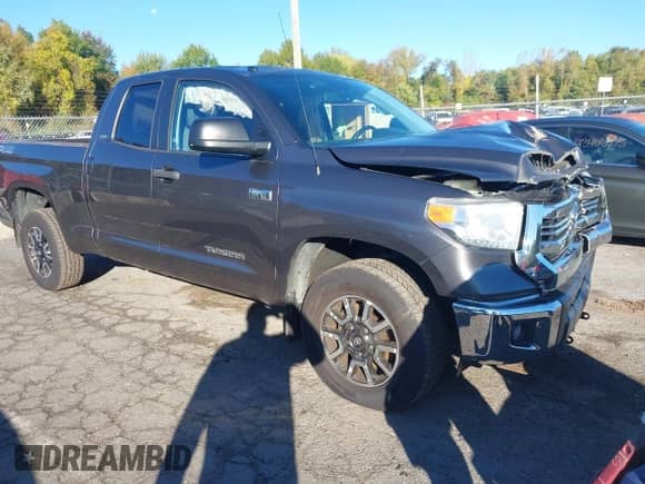 2016 Toyota Tundra SR with VIN 5TFUY5F1XGX506038, listed as a IAAI auction lot 43391833 with 139,754 mi miles and . Bid and sale history available at DreamBid. Image 1.