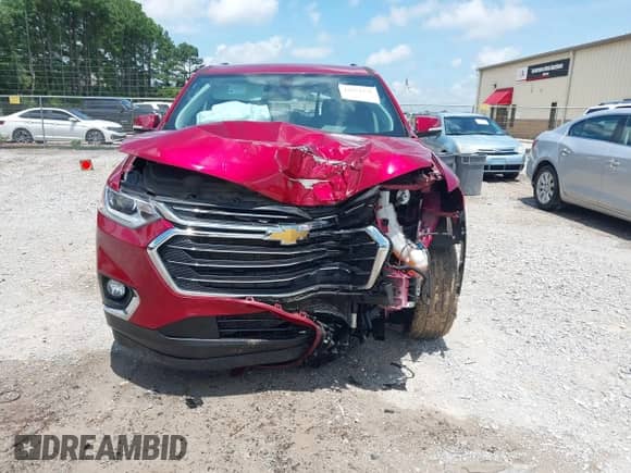 2020 Chevrolet Traverse LT with VIN 1GNERHKW4LJ118263, listed as a IAAI auction lot 42672331 with 78,185 mi miles and . Bid and sale history available at DreamBid. Image 12.