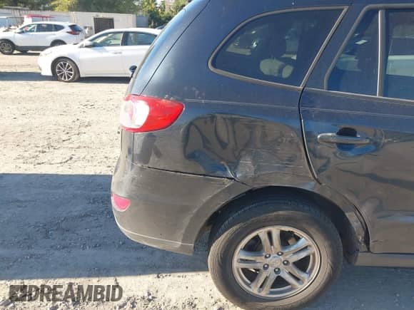 2011 Hyundai Santa Fe GLS z VIN 5XYZGDAB2BG083969, wystawiony jako IAAI lot #43480300 z przebiegiem 149 012 mil mil oraz . Historia ofert i sprzedaży dostępna na DreamBid. Obrazek 15.