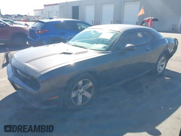 2013 Dodge Challenger SXT with VIN 2C3CDYAGXDH675016, listed as a IAAI auction lot 43325216 with 129,120 mi miles and . Bid and sale history available at DreamBid. Image 17.