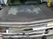 1993 Chevrolet Suburban z VIN 1GNFK16K7PJ392411, wystawiony jako Copart lot #43733375 z przebiegiem 245 702 mil mil oraz Szkoda całkowita • Salvage title. Historia ofert i sprzedaży dostępna na DreamBid. Obrazek 13.