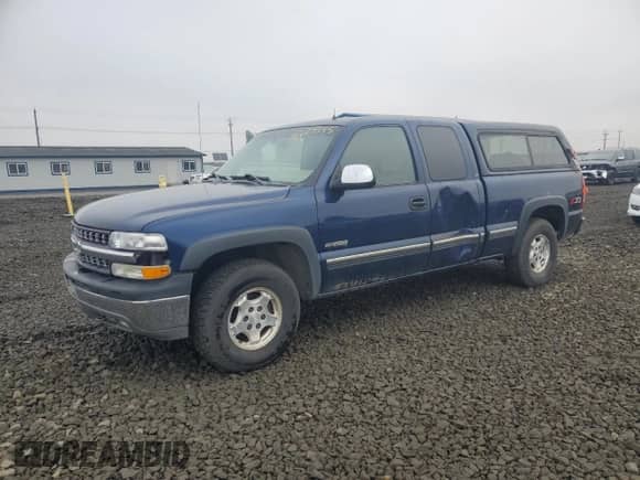 2002 Chevrolet Silverado 1500 LS z VIN 2GCEK19T621134585, wystawiony jako Copart lot #82629095 z przebiegiem 154 674 mil mil oraz Czysty tytuł • Clean title. Historia ofert i sprzedaży dostępna na DreamBid. Obrazek 1.