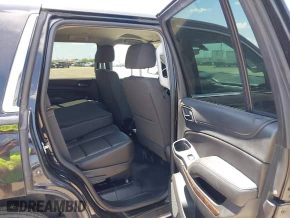 2020 Chevrolet Tahoe Commercial with VIN 1GNLCDECXLR141566, listed as a IAAI auction lot 43121218 with 106,037 mi miles and . Bid and sale history available at DreamBid. Image 8.