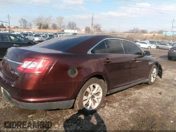 2010 Ford Taurus SEL with VIN 1FAHP2HW8AG135647, listed as a IAAI auction lot 40687874 with 101,000 mi miles and . Bid and sale history available at DreamBid. Image 4.