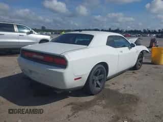 2010 Dodge Challenger SE with VIN 2B3CJ4DV4AH283301, listed as a IAAI auction lot 43381241 with 165,310 mi miles and . Bid and sale history available at DreamBid. Image 4.
