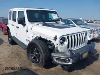 2021 Jeep Wrangler Unlimited Sahara with VIN 1C4JJXP6XMW840844, listed as a IAAI auction lot 42152271 with 68,209 mi miles and . Bid and sale history available at DreamBid. Image 1.