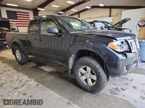 2012 Nissan Frontier SV with VIN 1N6AD0CW7CC466971, listed as a Copart auction lot 59786185 with 173,342 mi miles and Salvage title. Bid and sale history available at DreamBid. Image 4.