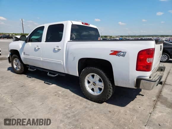 2013 Chevrolet Silverado 1500 LTZ z VIN 3GCPKTE79DG245753, wystawiony jako Copart lot #85829525 z przebiegiem 165 504 mil mil oraz Szkoda całkowita • Salvage title. Historia ofert i sprzedaży dostępna na DreamBid. Obrazek 2.