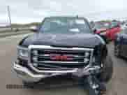 2017 GMC Sierra 1500 SLT with VIN 1GTV2NEC2HZ370535, listed as a IAAI auction lot 43370580 with 58,224 mi miles and . Bid and sale history available at DreamBid. Image 12.