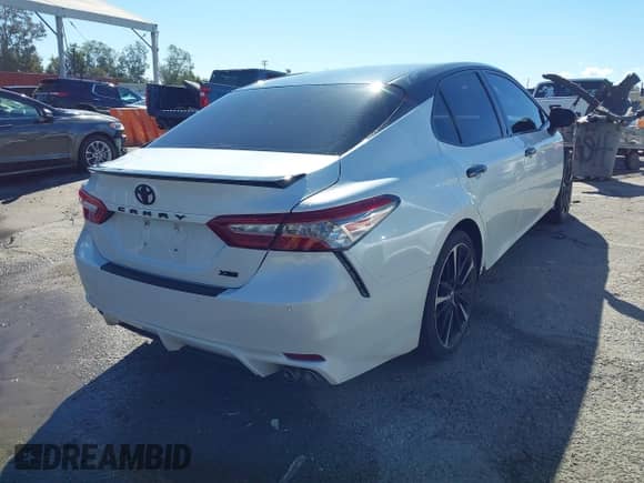 2018 Toyota Camry XSE z VIN 4T1B61HK6JU130616, wystawiony jako IAAI lot #43458207 z przebiegiem 136 344 mil mil oraz . Historia ofert i sprzedaży dostępna na DreamBid. Obrazek 4.