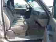 2005 Chevrolet Tahoe LT z VIN 1GNEC13T25J147583, wystawiony jako IAAI lot #42275971 z przebiegiem 244 307 mil mil oraz . Historia ofert i sprzedaży dostępna na DreamBid. Obrazek 5.