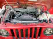 2000 Jeep Wrangler SE with VIN 1J4FA29P4YP798115, listed as a Copart auction lot 80751605 with 119,345 mi miles and Salvage title. Bid and sale history available at DreamBid. Image 11.