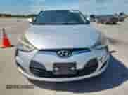 2012 Hyundai Veloster w/Red Int z VIN KMHTC6ADXCU036716, wystawiony jako Copart lot #63408115 z przebiegiem 144 117 mil mil oraz Szkoda całkowita • Salvage title. Historia ofert i sprzedaży dostępna na DreamBid. Obrazek 5.