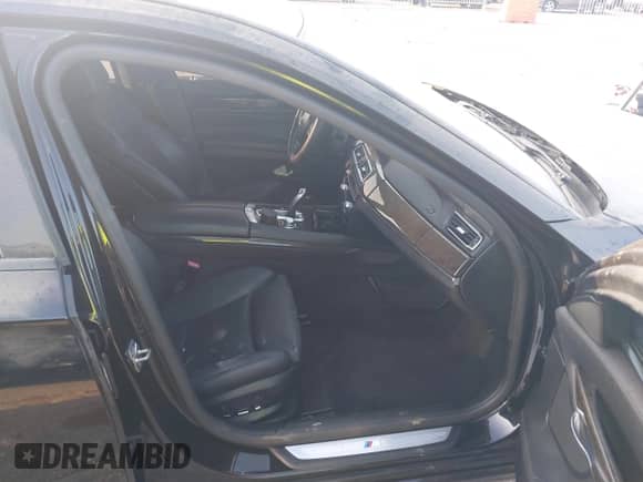 2012 BMW 7 Series 740Li z VIN WBAKB4C56CC576810, wystawiony jako IAAI lot #43364646 z przebiegiem 115 234 mil mil oraz . Historia ofert i sprzedaży dostępna na DreamBid. Obrazek 5.