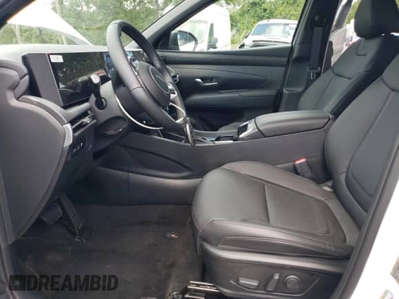 2025 Hyundai Tucson SEL with VIN 5NMJFCDE1SH497492, listed as a Copart auction lot 70523465 with 18 mi miles and Salvage title. Bid and sale history available at DreamBid. Image 7.