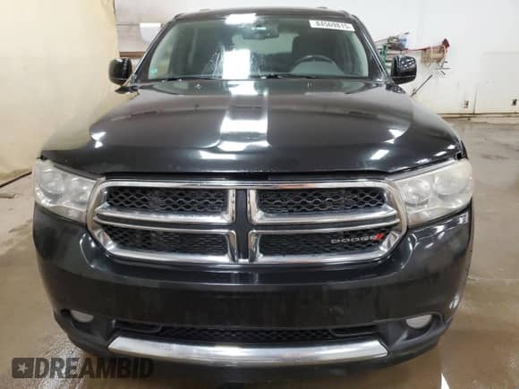 2012 Dodge Durango SXT z VIN 1C4RDJAG8CC106051, wystawiony jako Copart lot #84569815 z przebiegiem 227 688 mil mil oraz Czysty tytuł • Clean title. Historia ofert i sprzedaży dostępna na DreamBid. Obrazek 5.