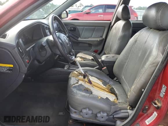 2004 Hyundai Elantra GT z VIN KMHDN56D94U110176, wystawiony jako Copart lot #64356595 z przebiegiem 343 675 mil mil oraz Nie do naprawy • Non repairable. Historia ofert i sprzedaży dostępna na DreamBid. Obrazek 7.