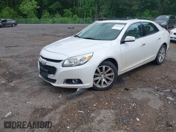 2015 Chevrolet Malibu LTZ with VIN 1G11F5SL0FF220857, listed as a IAAI auction lot 42107647 with 143,330 mi miles and . Bid and sale history available at DreamBid. Image 2.