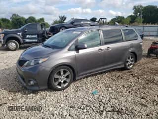 2012 Toyota Sienna SE with VIN 5TDXK3DC0CS183187, listed as a Copart auction lot 84005925 with 258,804 mi miles and Salvage title. Bid and sale history available at DreamBid. Image 1.