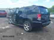 2013 Chevrolet Tahoe LT with VIN 1GNSCBE09DR366696, listed as a IAAI auction lot 42201250 with 199,105 mi miles and . Bid and sale history available at DreamBid. Image 3.