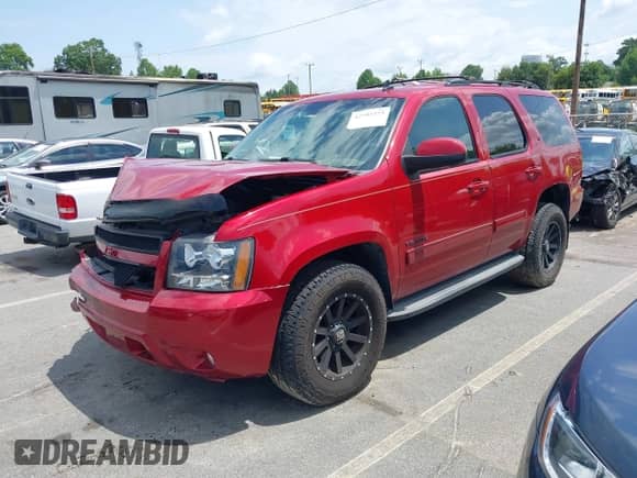 2013 Chevrolet Tahoe LT z VIN 1GNSKBE07DR140787, wystawiony jako IAAI lot #42792275 z przebiegiem 128 778 mil mil oraz . Historia ofert i sprzedaży dostępna na DreamBid. Obrazek 17.
