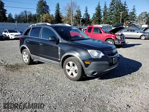 2013 Chevrolet Captiva Sport LS z VIN 3GNAL2EK2DS616077, wystawiony jako Copart lot #79510774 z przebiegiem 143 763 mil mil oraz Szkoda całkowita • Salvage title. Historia ofert i sprzedaży dostępna na DreamBid. Obrazek 10.