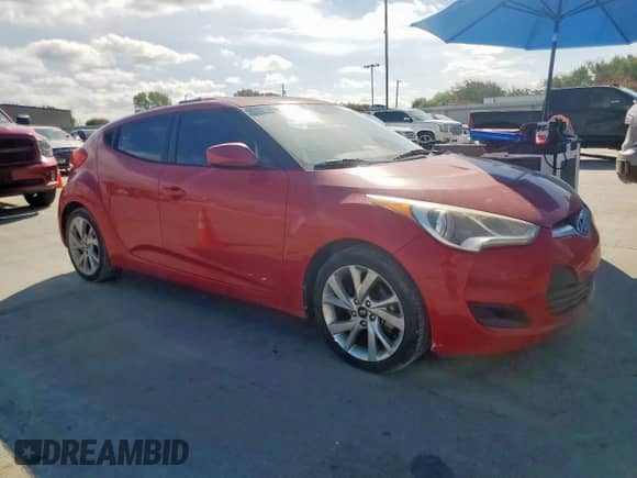 2016 Hyundai Veloster with VIN KMHTC6AD4GU284031, listed as a Copart auction lot 82049985 with 127,545 mi miles and Salvage title. Bid and sale history available at DreamBid. Image 4.