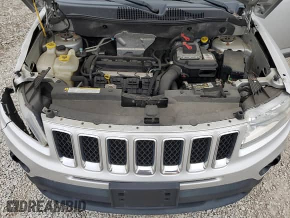 2011 Jeep Compass with VIN 1J4NT1FA6BD173305, listed as a Copart auction lot 87358405 with 112,019 mi miles and Salvage title. Bid and sale history available at DreamBid. Image 12.