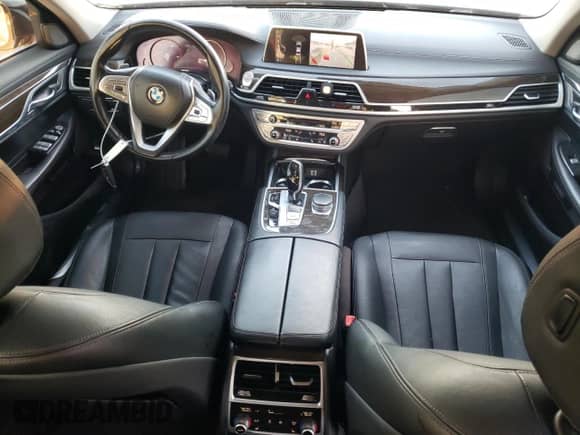 2017 BMW 7 Series 740i xDrive с VIN WBA7E4C55HGU99795, выставлен на аукционе Copart как лот 85545124 с пробегом 99 304 миль миль и Списание • Salvage title. История ставок и продаж доступна на DreamBid. Изображение 8.