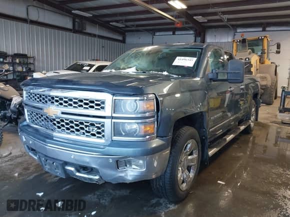 2014 Chevrolet Silverado 1500 LTZ z VIN 1GCVKSEJ2EZ312286, wystawiony jako IAAI lot #41496345 z przebiegiem 76 747 mil mil oraz . Historia ofert i sprzedaży dostępna na DreamBid. Obrazek 2.