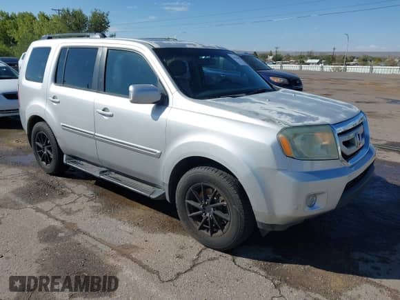 2009 Honda Pilot Touring with VIN 5FNYF48889B014312, listed as a IAAI auction lot 43528408 with 238,282 mi miles and . Bid and sale history available at DreamBid. Image 1.