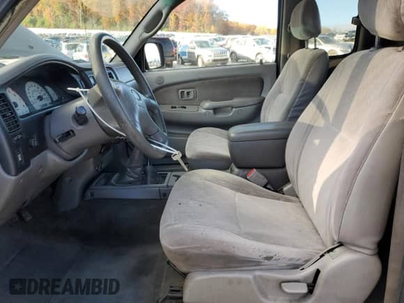 2001 Toyota Tacoma with VIN 5TEWN72N81Z873896, listed as a Copart auction lot 82741565 with 186,530 mi miles and Clean title. Bid and sale history available at DreamBid. Image 7.