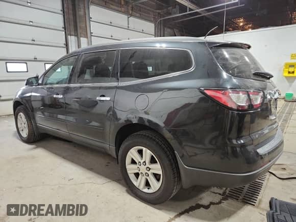 2014 Chevrolet Traverse LT z VIN 1GNKRHKDXEJ153510, wystawiony jako Copart lot #84068795 z przebiegiem 145 015 mil mil oraz Czysty tytuł • Clean title. Historia ofert i sprzedaży dostępna na DreamBid. Obrazek 2.