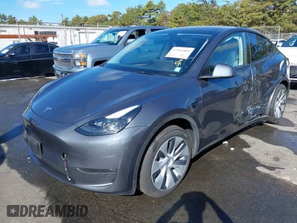 2023 Tesla Model Y Long Range with VIN 7SAYGDEE4PA192738, listed as a IAAI auction lot 43364402 with 14,872 mi miles and . Bid and sale history available at DreamBid. Image 20.