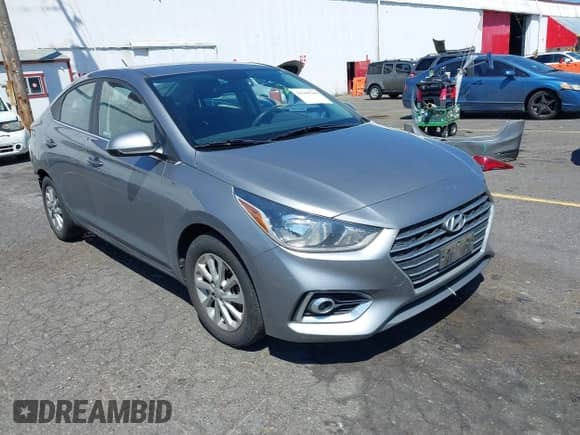 2022 Hyundai Accent SE z VIN 3KPC24A67NE156021, wystawiony jako IAAI lot #42789769 z przebiegiem 74 618 mil mil oraz . Historia ofert i sprzedaży dostępna na DreamBid. Obrazek 1.