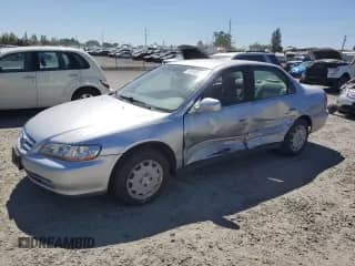 2001 Honda Accord LX with VIN JHMCG66521C011661, listed as a Copart auction lot 67249645 with 125,713 mi miles and Salvage title. Bid and sale history available at DreamBid. Image 1.