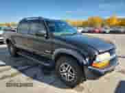 2003 Chevrolet S-10 LS with VIN 1GCDT13X53K180687, listed as a Copart auction lot 89549505 with 142,593 mi miles and Salvage title. Bid and sale history available at DreamBid. Image 4.