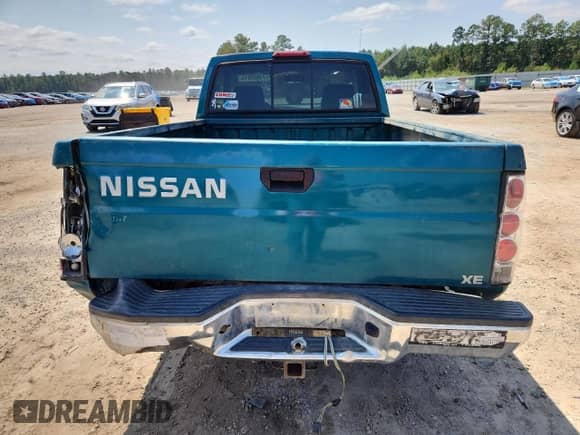 1995 Nissan Frontier with VIN 1N6SD11S3SC358078, listed as a Copart auction lot 71859815 with 118,833 mi miles and Salvage title. Bid and sale history available at DreamBid. Image 6.