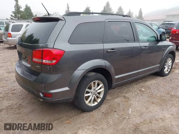 2015 Dodge Journey SXT with VIN 3C4PDDBG8FT533746, listed as a IAAI auction lot 43301775 with 150,956 mi miles and . Bid and sale history available at DreamBid. Image 4.