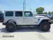 2023 Jeep Wrangler Rubicon with VIN 1C4JJXFG0PW522651, listed as a IAAI auction lot 42112210 with 7,744 mi miles and . Bid and sale history available at DreamBid. Image 14.