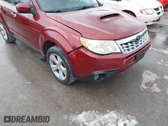 2012 Subaru Forester XT Premium z VIN JF2SHGAC2CH468578, wystawiony jako IAAI lot #41315950 z przebiegiem 213 860 mil mil oraz . Historia ofert i sprzedaży dostępna na DreamBid. Obrazek 19.