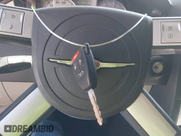 2006 Chrysler 300 C SRT-8 с VIN 2C3KA73W56H332748, выставлен на аукционе IAAI как лот 43292460 с пробегом 168 014 миль миль и . История ставок и продаж доступна на DreamBid. Изображение 11.