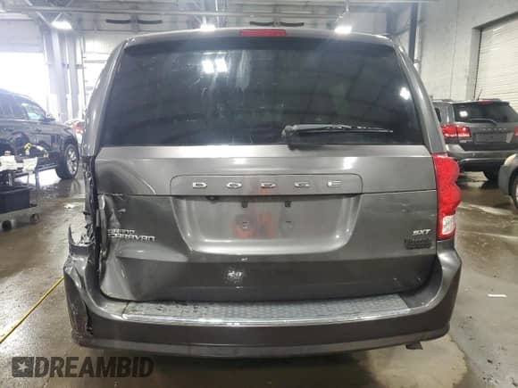 2014 Dodge Grand Caravan SXT с VIN 2C4RDGCG5ER463309, выставлен на аукционе Copart как лот 68888595 с пробегом 112 954 миль миль и Списание • Salvage title. История ставок и продаж доступна на DreamBid. Изображение 6.
