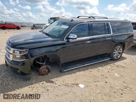 2015 Chevrolet Suburban LTZ z VIN 1GNSKKKC8FR165831, wystawiony jako Copart lot #81661365 z przebiegiem Nie podano mil oraz Czysty tytuł • Clean title. Historia ofert i sprzedaży dostępna na DreamBid. Obrazek 1.
