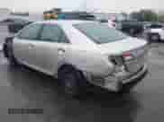 2014 Toyota Camry LE with VIN 4T4BF1FK4ER401493, listed as a IAAI auction lot 43303455 with 183,665 mi miles and . Bid and sale history available at DreamBid. Image 3.