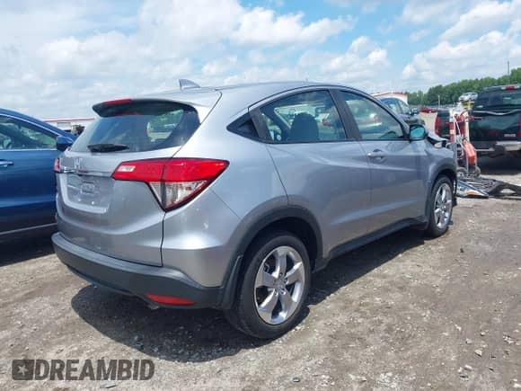 2022 Honda HR-V LX with VIN 3CZRU5H39NM716661, listed as a IAAI auction lot 42529727 with 13,600 mi miles and . Bid and sale history available at DreamBid. Image 4.