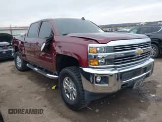 2016 Chevrolet Silverado 2500HD LT z VIN 1GC1KVEG7GF303768, wystawiony jako IAAI lot #41536547 z przebiegiem 157 544 mil mil oraz . Historia ofert i sprzedaży dostępna na DreamBid. Obrazek 1.